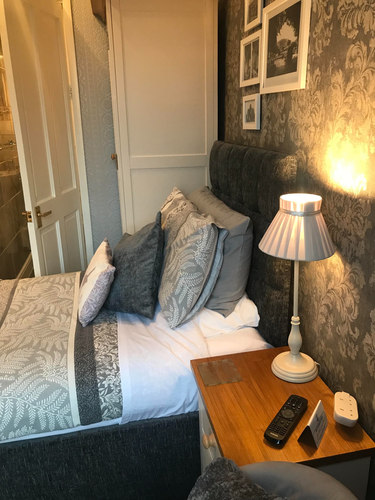 Grey guest room bedside details
